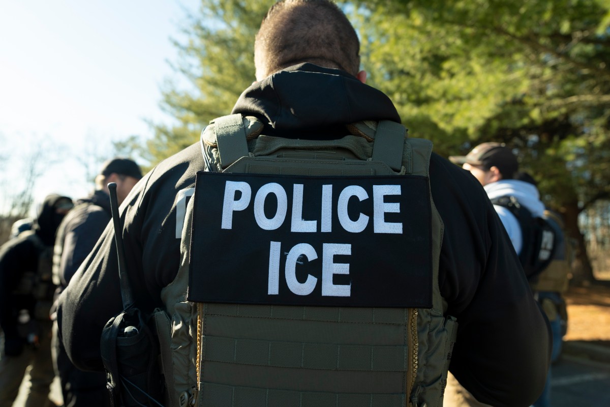Man with ICE jacket